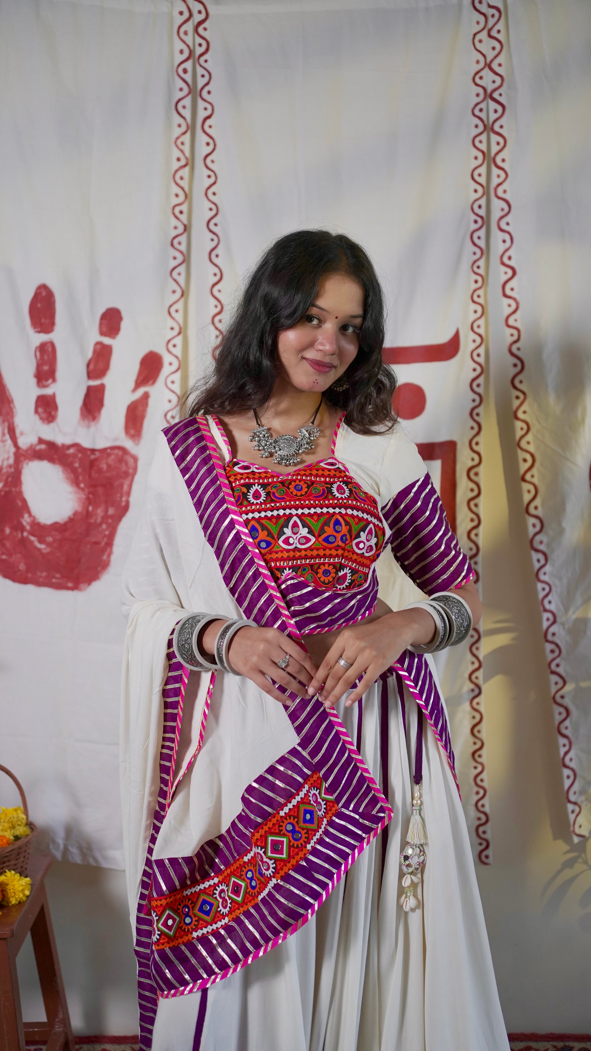 White and purple lehenga set with short blouse