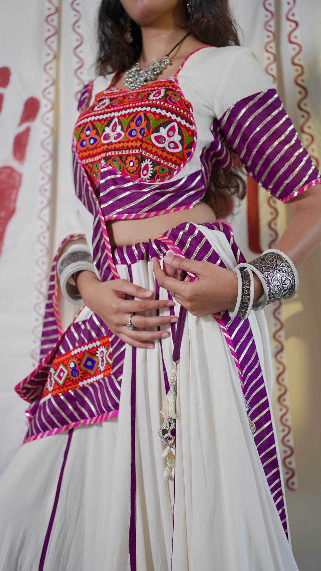 White and purple lehenga set with short blouse