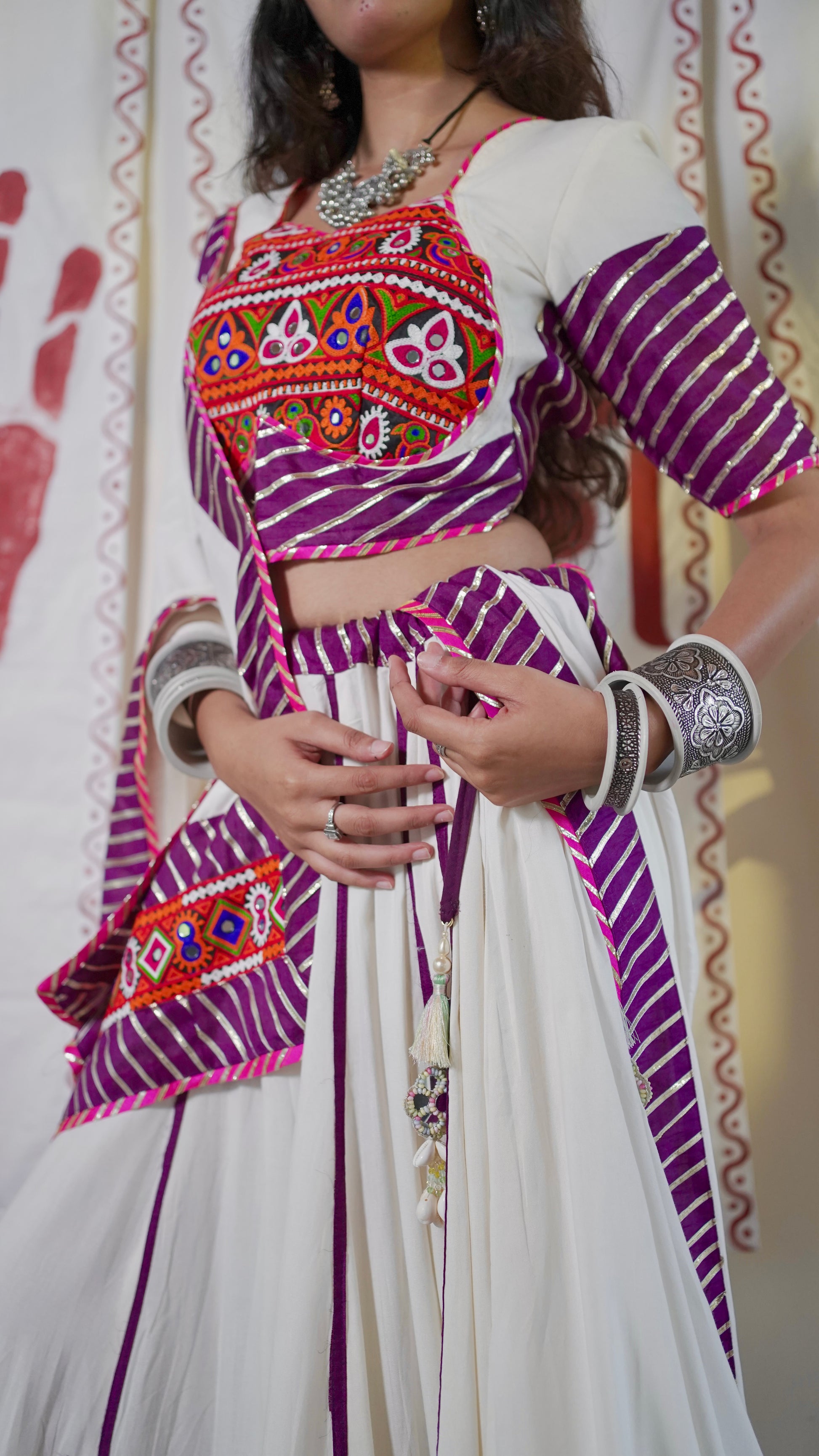 White and purple lehenga set with short blouse